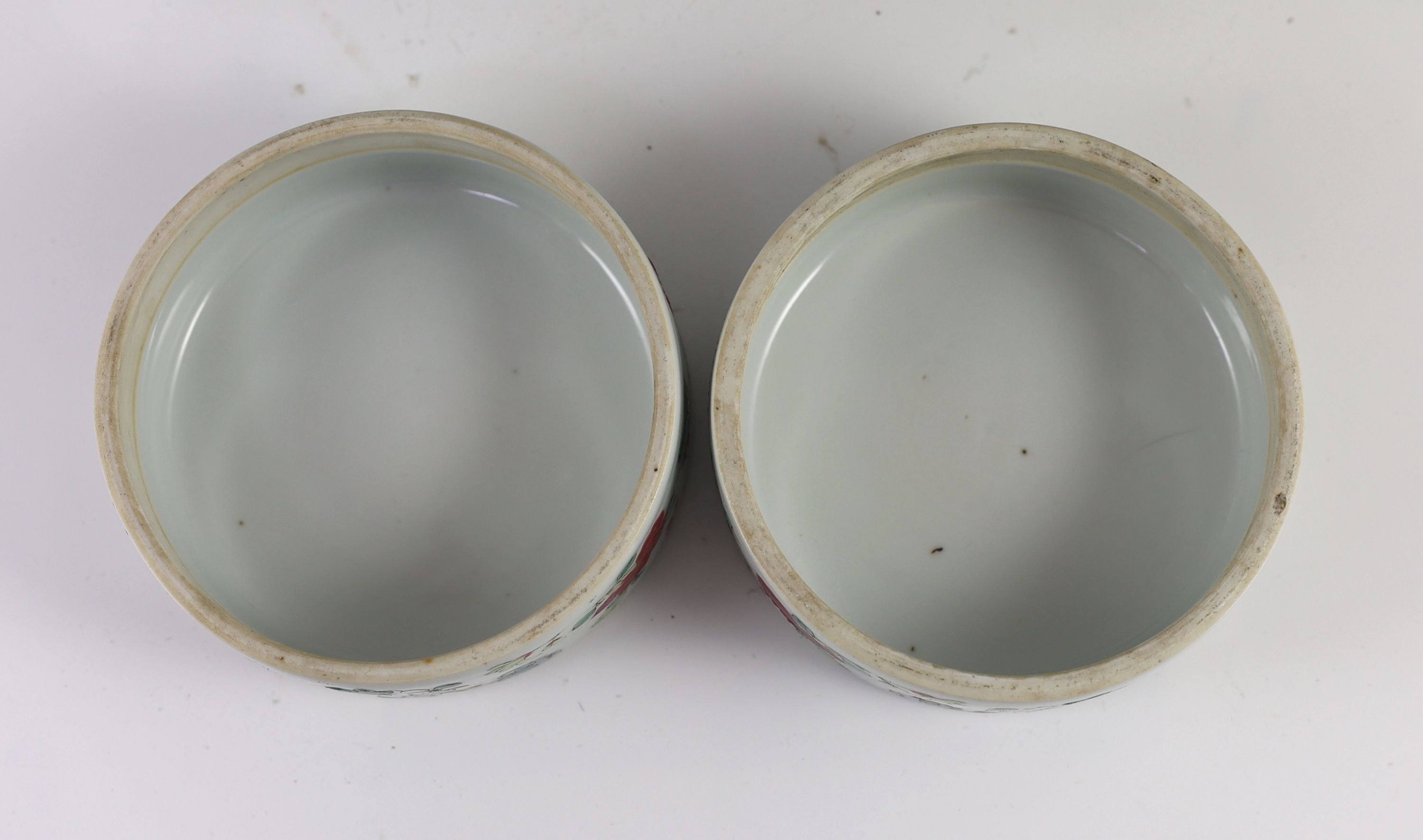 A good pair of Chinese famille rose ovoid jars and covers, 19th century, 28.5 cm high